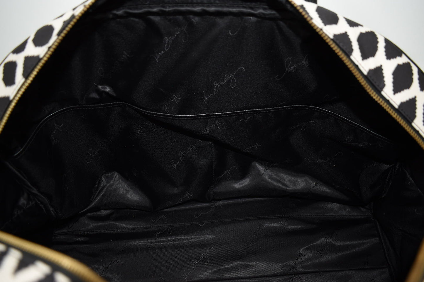 Vera Bradley Leather Trimmed Weekender Bag in "Ikat Spots" Pattern