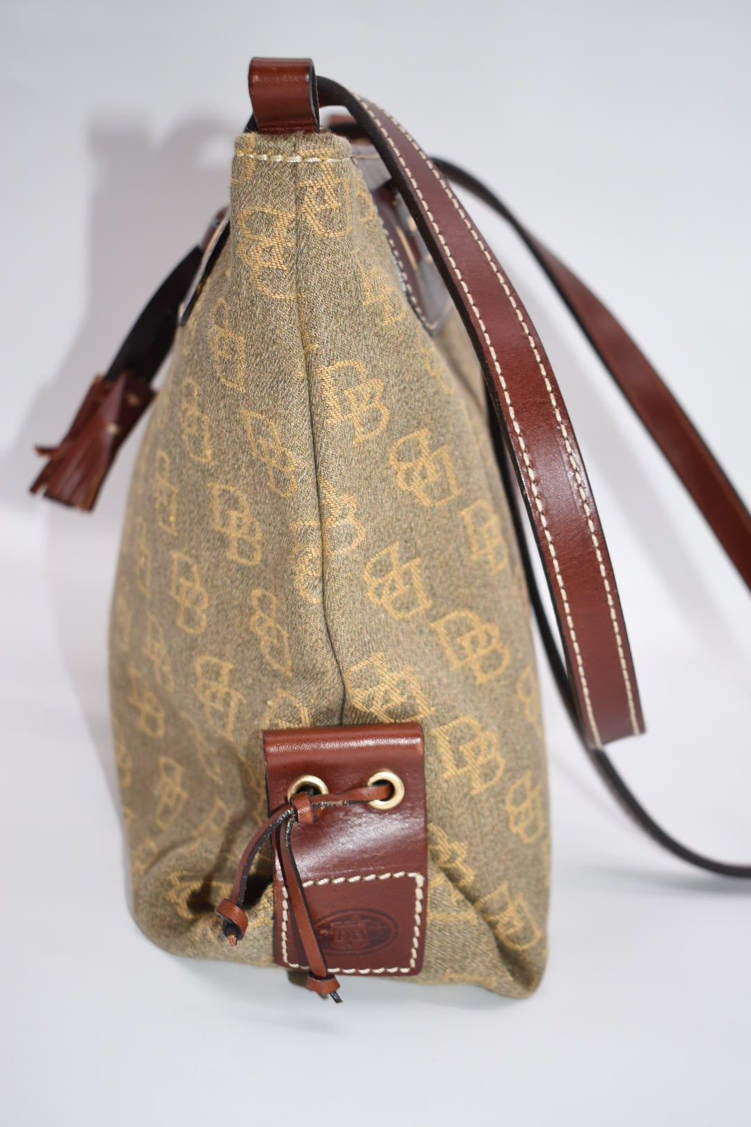 Dooney & Bourke Signature Leather/Canvas Zip Top Tassel Tote Bag