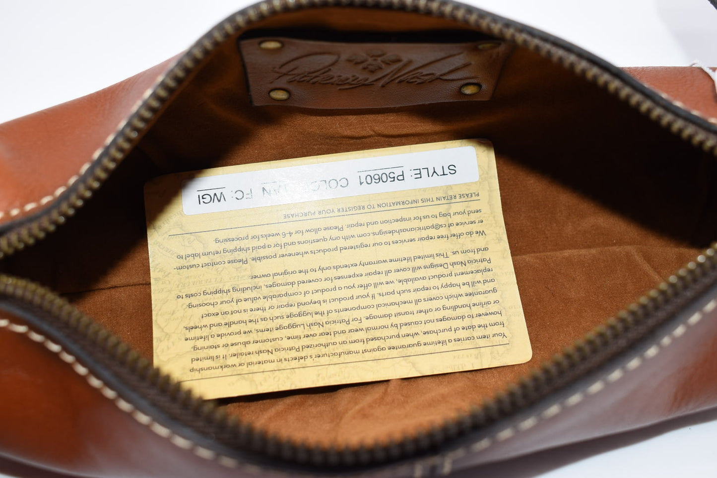 Patricia Nash Isla Oblong Zip Pouch Wristlet in Tan