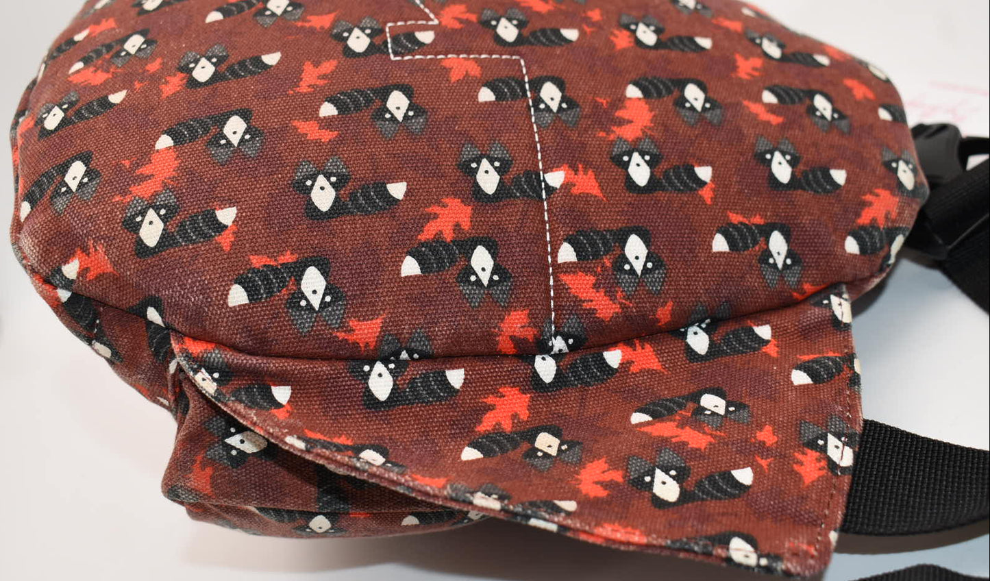 Kavu Rope Sling Bag in Red Critters Racoon