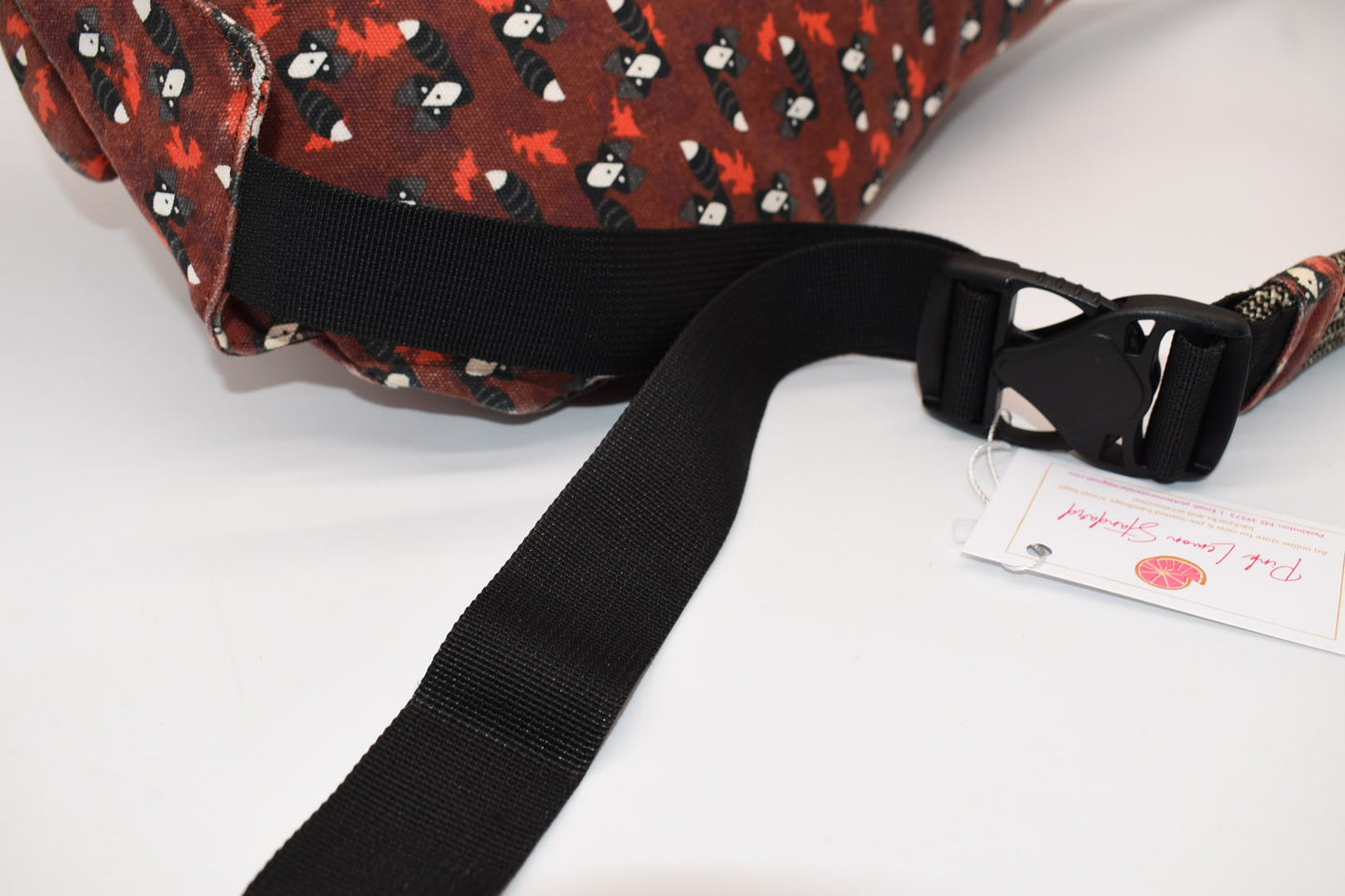 Kavu Rope Sling Bag in Red Critters Racoon