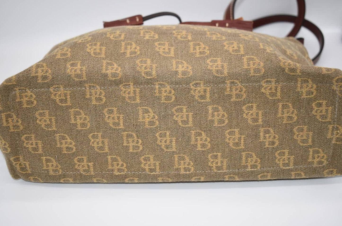 Dooney & Bourke Signature Leather/Canvas Zip Top Tassel Tote Bag